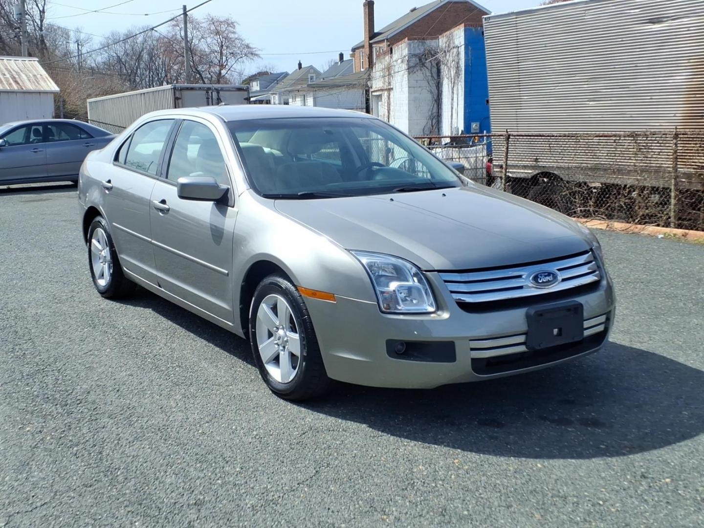 2009 Brown Ford Fusion (3FAHP07Z09R) with an 2.3L 4 Cylinder Sequential-Port F.I. engine, Automatic transmission, located at 50 Eastern Blvd., Essex, MD, 21221, (410) 686-3444, 39.304367, -76.484947 - Photo#4