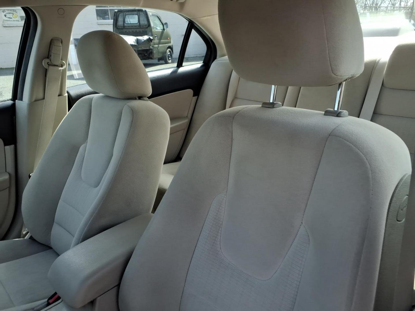 2009 Brown Ford Fusion (3FAHP07Z09R) with an 2.3L 4 Cylinder Sequential-Port F.I. engine, Automatic transmission, located at 50 Eastern Blvd., Essex, MD, 21221, (410) 686-3444, 39.304367, -76.484947 - Photo#7