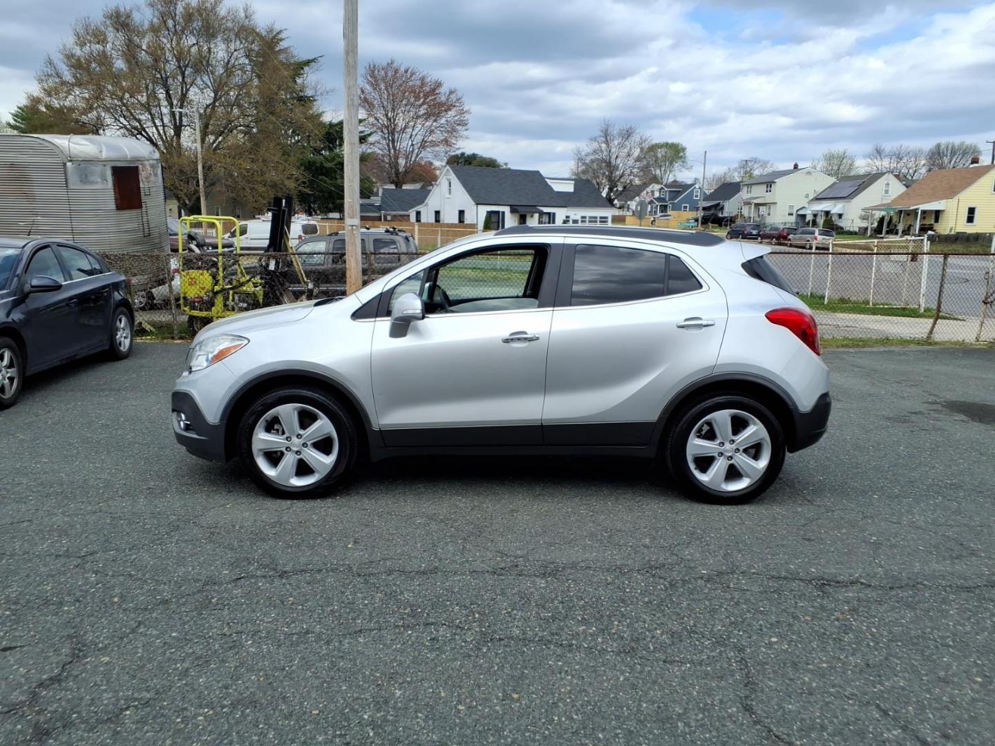 2016 Silver Buick Encore Leather (KL4CJCSB3GB) with an 1.4L Ecotec 1.4L Turbo I4 138hp 148ft. lbs. Sequential-Port F.I. engine, 6-Speed Automatic w/Driver Shift Control transmission, located at 50 Eastern Blvd., Essex, MD, 21221, (410) 686-3444, 39.304367, -76.484947 - Photo#1