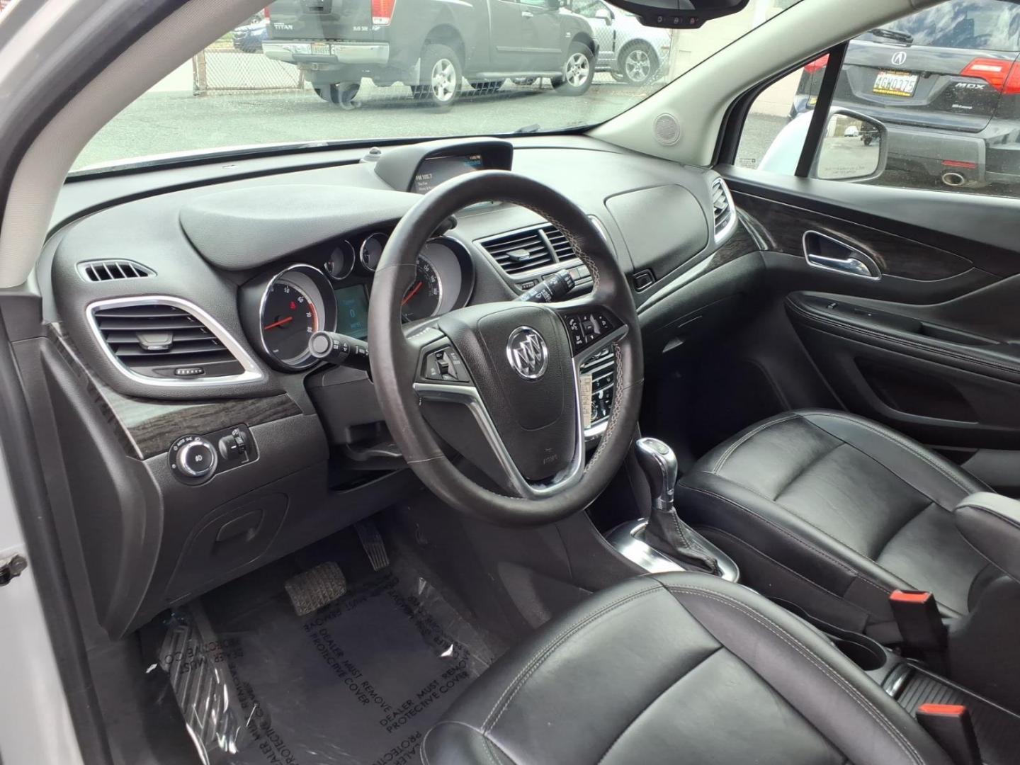 2016 Silver Buick Encore Leather (KL4CJCSB3GB) with an 1.4L Ecotec 1.4L Turbo I4 138hp 148ft. lbs. Sequential-Port F.I. engine, 6-Speed Automatic w/Driver Shift Control transmission, located at 50 Eastern Blvd., Essex, MD, 21221, (410) 686-3444, 39.304367, -76.484947 - Photo#8