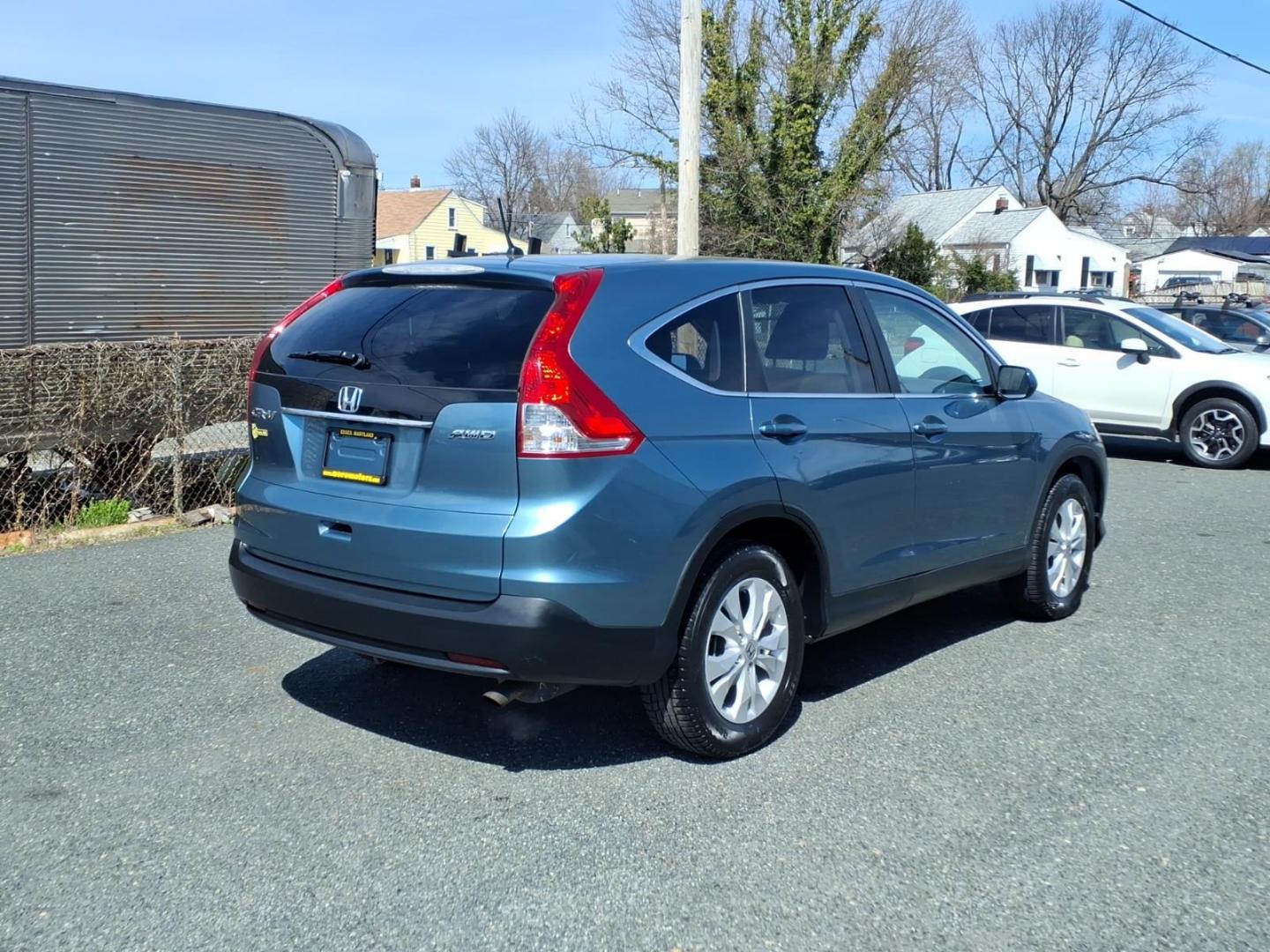 2013 Blue Honda CR-V EX (5J6RM4H53DL) with an 2.4L 2.4L I4 185hp 163ft. lbs. Sequential-Port F.I. engine, 5-Speed Automatic transmission, located at 50 Eastern Blvd., Essex, MD, 21221, (410) 686-3444, 39.304367, -76.484947 - Photo#4