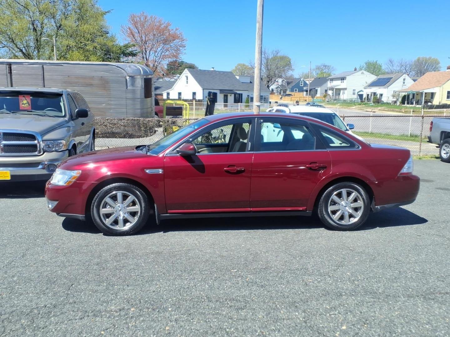 2008 Burgundy Ford Taurus SEL (1FAHP24W58G) with an 3.5L 3.5L V6 263hp 249ft. lbs. Sequential-Port F.I. engine, 6-Speed Automatic transmission, located at 50 Eastern Blvd., Essex, MD, 21221, (410) 686-3444, 39.304367, -76.484947 - Photo#1