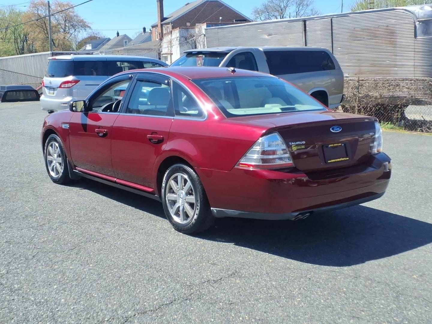 2008 Burgundy Ford Taurus SEL (1FAHP24W58G) with an 3.5L 3.5L V6 263hp 249ft. lbs. Sequential-Port F.I. engine, 6-Speed Automatic transmission, located at 50 Eastern Blvd., Essex, MD, 21221, (410) 686-3444, 39.304367, -76.484947 - Photo#2
