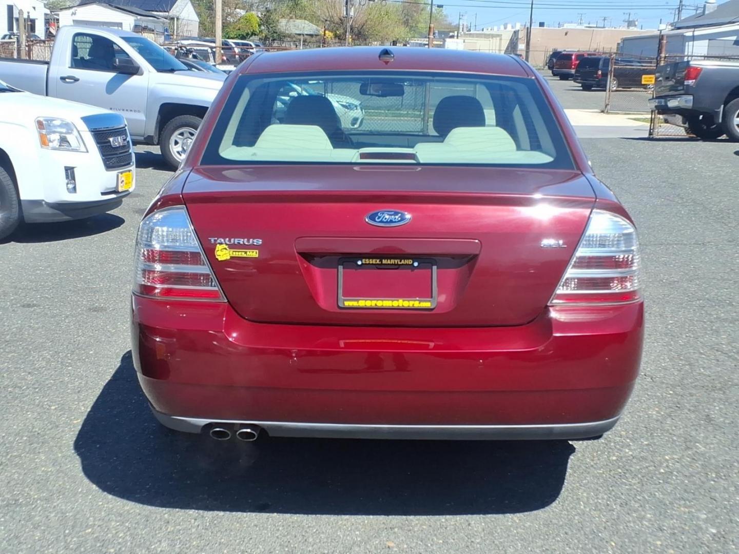 2008 Burgundy Ford Taurus SEL (1FAHP24W58G) with an 3.5L 3.5L V6 263hp 249ft. lbs. Sequential-Port F.I. engine, 6-Speed Automatic transmission, located at 50 Eastern Blvd., Essex, MD, 21221, (410) 686-3444, 39.304367, -76.484947 - Photo#3