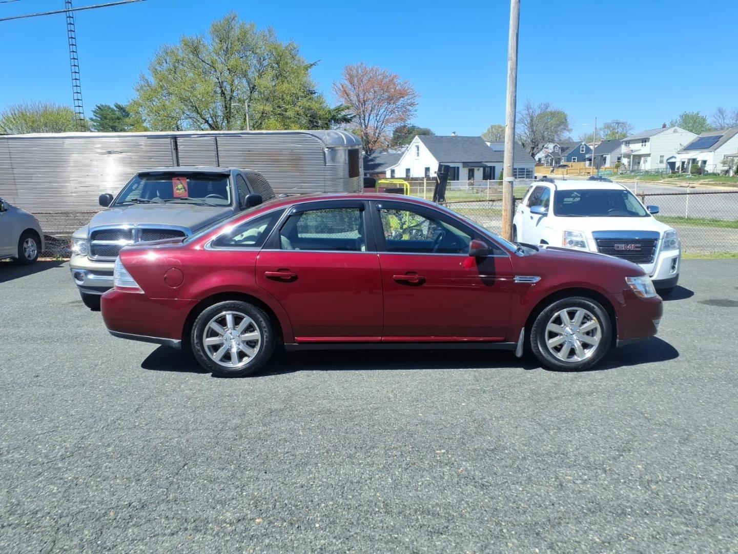 2008 Burgundy Ford Taurus SEL (1FAHP24W58G) with an 3.5L 3.5L V6 263hp 249ft. lbs. Sequential-Port F.I. engine, 6-Speed Automatic transmission, located at 50 Eastern Blvd., Essex, MD, 21221, (410) 686-3444, 39.304367, -76.484947 - Photo#5