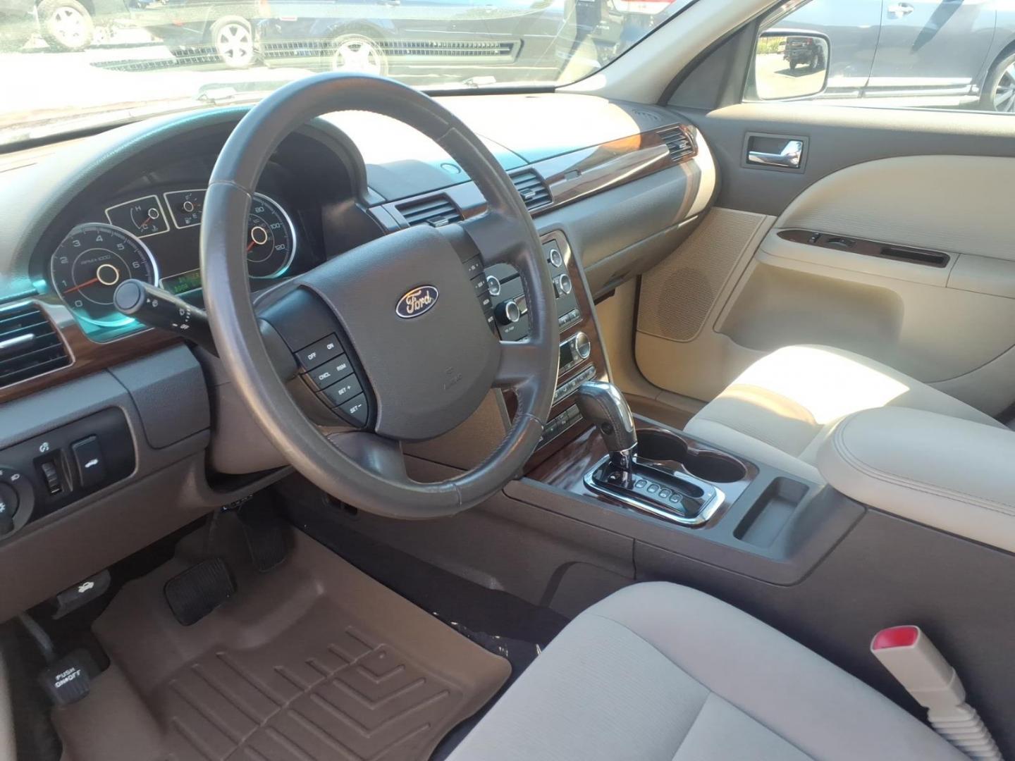 2008 Burgundy Ford Taurus SEL (1FAHP24W58G) with an 3.5L 3.5L V6 263hp 249ft. lbs. Sequential-Port F.I. engine, 6-Speed Automatic transmission, located at 50 Eastern Blvd., Essex, MD, 21221, (410) 686-3444, 39.304367, -76.484947 - Photo#9