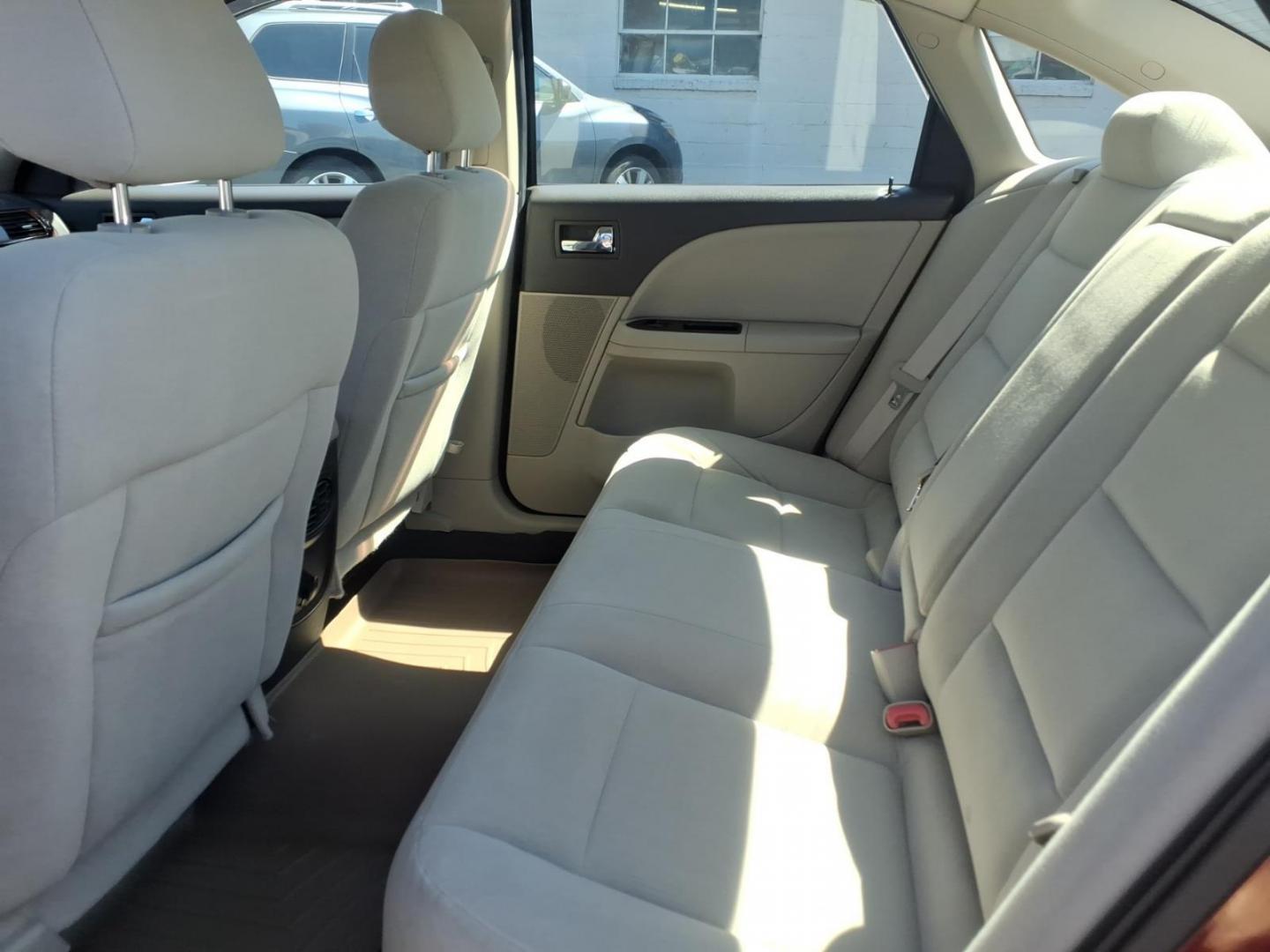 2008 Burgundy Ford Taurus SEL (1FAHP24W58G) with an 3.5L 3.5L V6 263hp 249ft. lbs. Sequential-Port F.I. engine, 6-Speed Automatic transmission, located at 50 Eastern Blvd., Essex, MD, 21221, (410) 686-3444, 39.304367, -76.484947 - Photo#11