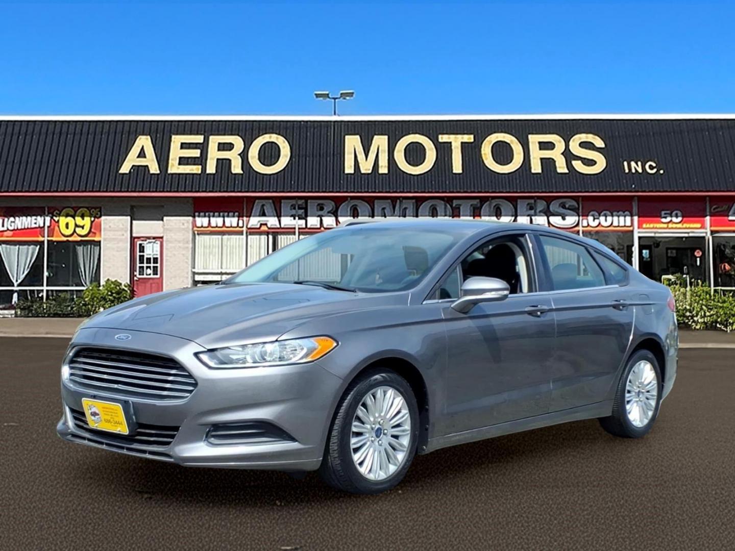2013 Gray Ford Fusion Hybrid SE (3FA6P0LU0DR) with an 2.0L 4 Cylinder Sequential-Port F.I. engine, 4CYL transmission, located at 50 Eastern Blvd., Essex, MD, 21221, (410) 686-3444, 39.304367, -76.484947 - Photo#0