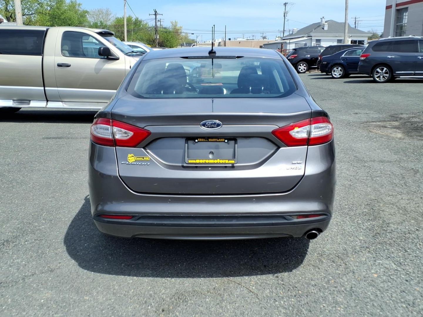 2013 Gray Ford Fusion Hybrid SE (3FA6P0LU0DR) with an 2.0L 4 Cylinder Sequential-Port F.I. engine, 4CYL transmission, located at 50 Eastern Blvd., Essex, MD, 21221, (410) 686-3444, 39.304367, -76.484947 - Photo#3