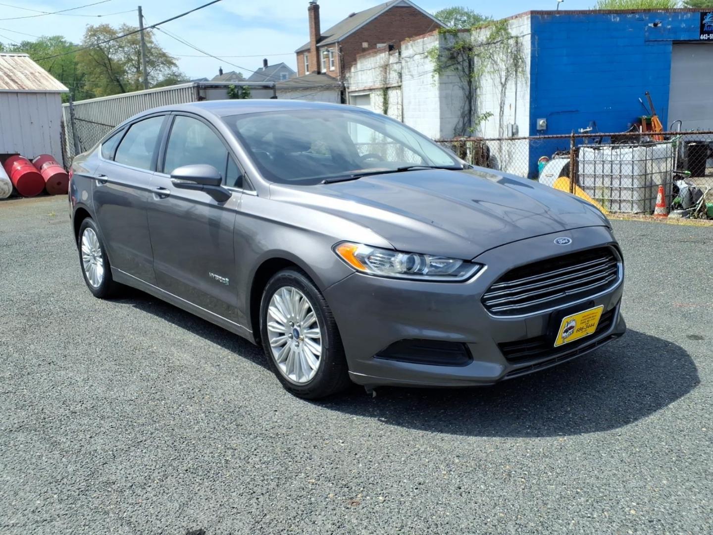 2013 Gray Ford Fusion Hybrid SE (3FA6P0LU0DR) with an 2.0L 4 Cylinder Sequential-Port F.I. engine, 4CYL transmission, located at 50 Eastern Blvd., Essex, MD, 21221, (410) 686-3444, 39.304367, -76.484947 - Photo#6
