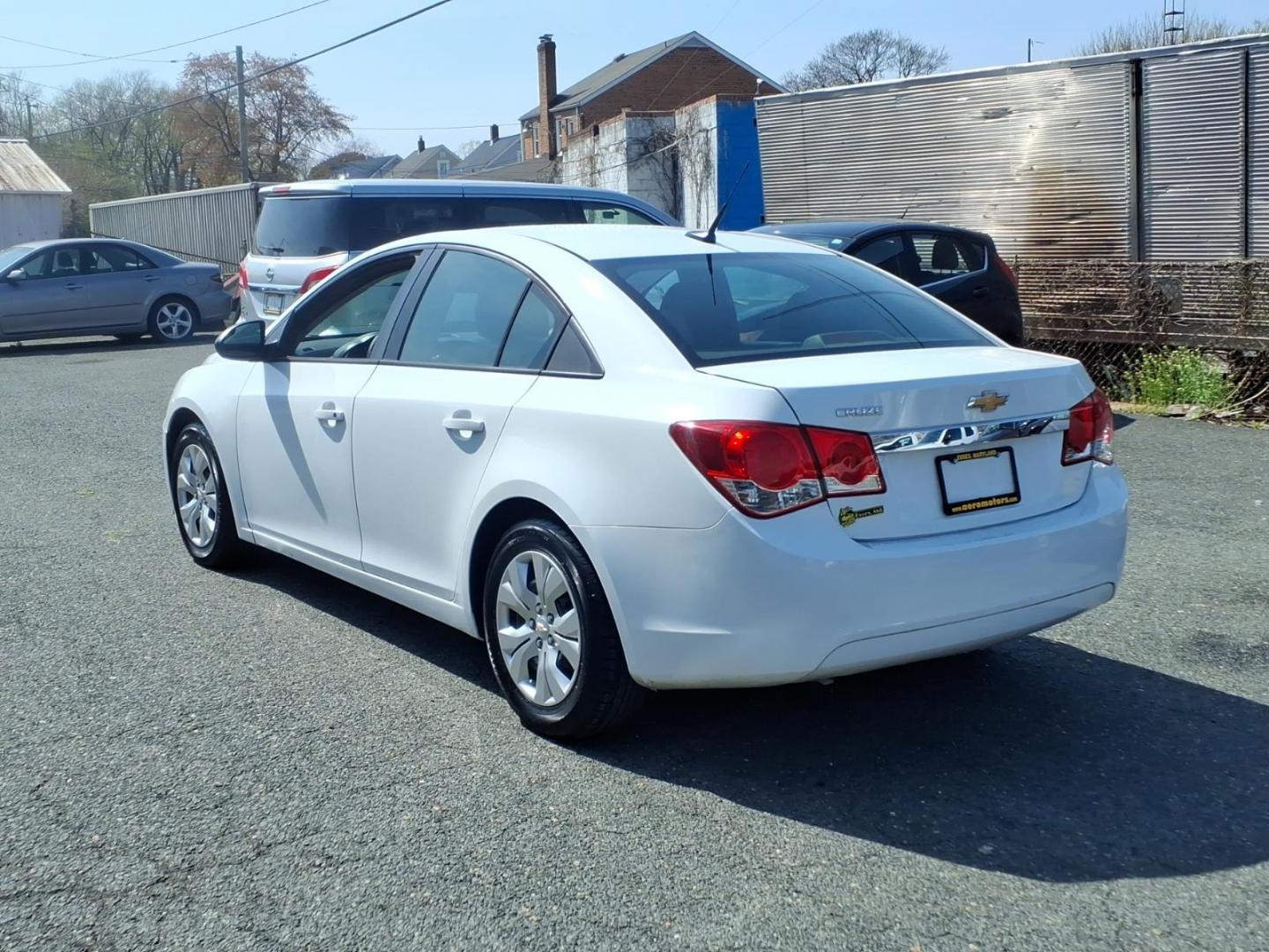 2014 White Chevrolet Cruze LS Auto (1G1PA5SH9E7) with an 1.8L 4 Cylinder Sequential-Port F.I. engine, 4CYL transmission, located at 50 Eastern Blvd., Essex, MD, 21221, (410) 686-3444, 39.304367, -76.484947 - Photo#2