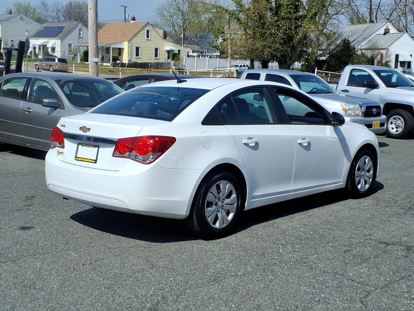 2014 White Chevrolet Cruze LS Auto (1G1PA5SH9E7) with an 1.8L 4 Cylinder Sequential-Port F.I. engine, 4CYL transmission, located at 50 Eastern Blvd., Essex, MD, 21221, (410) 686-3444, 39.304367, -76.484947 - Photo#4