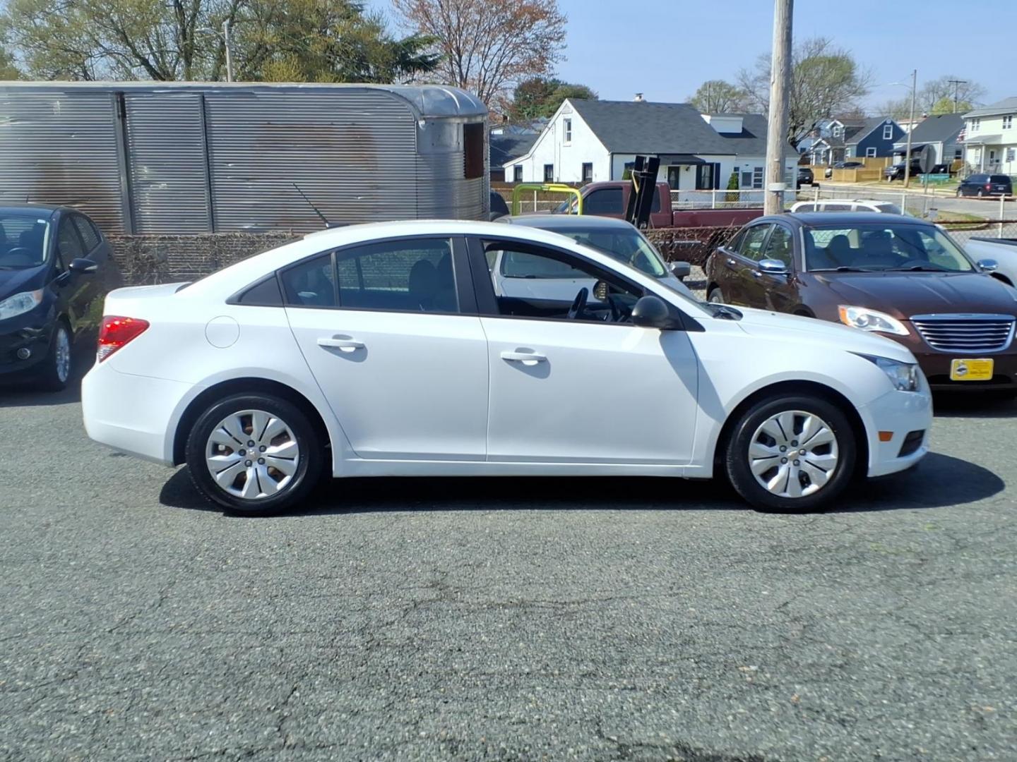2014 White Chevrolet Cruze LS Auto (1G1PA5SH9E7) with an 1.8L 4 Cylinder Sequential-Port F.I. engine, 4CYL transmission, located at 50 Eastern Blvd., Essex, MD, 21221, (410) 686-3444, 39.304367, -76.484947 - Photo#5