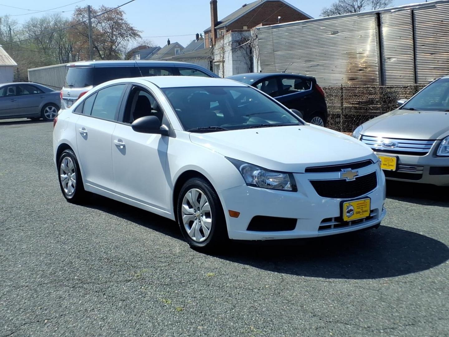 2014 White Chevrolet Cruze LS Auto (1G1PA5SH9E7) with an 1.8L 4 Cylinder Sequential-Port F.I. engine, 4CYL transmission, located at 50 Eastern Blvd., Essex, MD, 21221, (410) 686-3444, 39.304367, -76.484947 - Photo#6