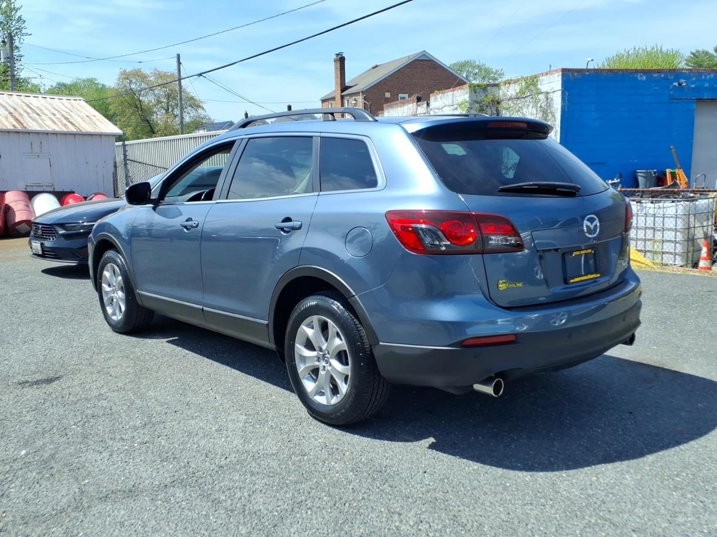 2015 Blue Mazda CX-9 Touring (JM3TB3CV1F0) with an 3.7L 6 Cylinder Fuel Injected engine, V6AT transmission, located at 50 Eastern Blvd., Essex, MD, 21221, (410) 686-3444, 39.304367, -76.484947 - Photo#2