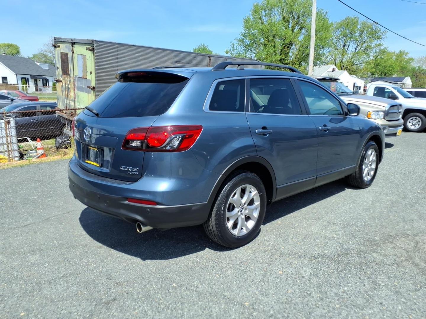 2015 Blue Mazda CX-9 Touring (JM3TB3CV1F0) with an 3.7L 6 Cylinder Fuel Injected engine, V6AT transmission, located at 50 Eastern Blvd., Essex, MD, 21221, (410) 686-3444, 39.304367, -76.484947 - Photo#4