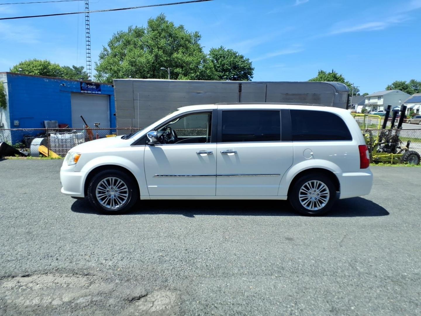 2013 White Chrysler Town and Country Touring-L (2C4RC1CG3DR) with an 3.6L 6 Cylinder Sequential-Port F.I. engine, AT V6 transmission, located at 50 Eastern Blvd., Essex, MD, 21221, (410) 686-3444, 39.304367, -76.484947 - Photo#1