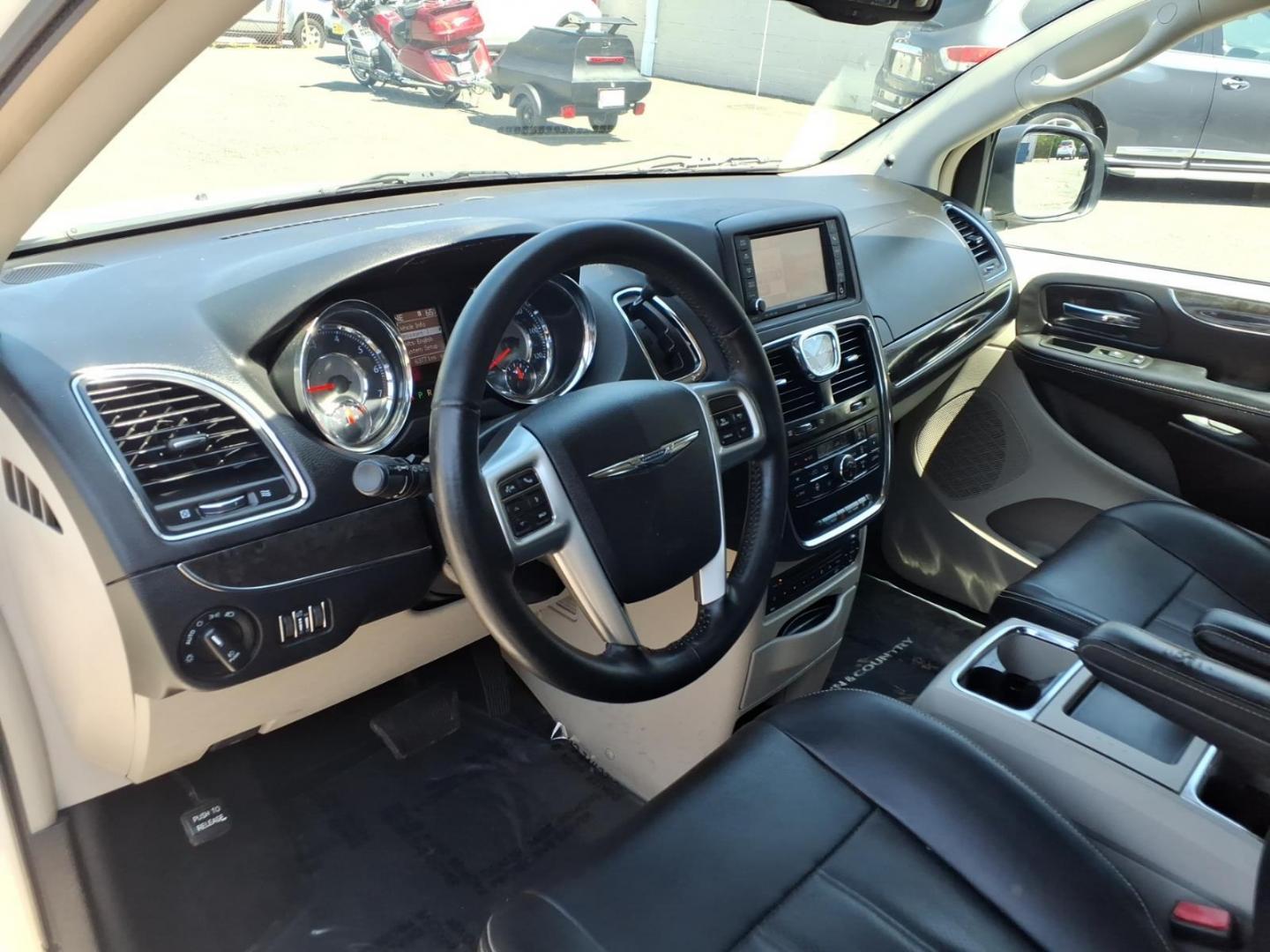 2013 White Chrysler Town and Country Touring-L (2C4RC1CG3DR) with an 3.6L 6 Cylinder Sequential-Port F.I. engine, AT V6 transmission, located at 50 Eastern Blvd., Essex, MD, 21221, (410) 686-3444, 39.304367, -76.484947 - Photo#7