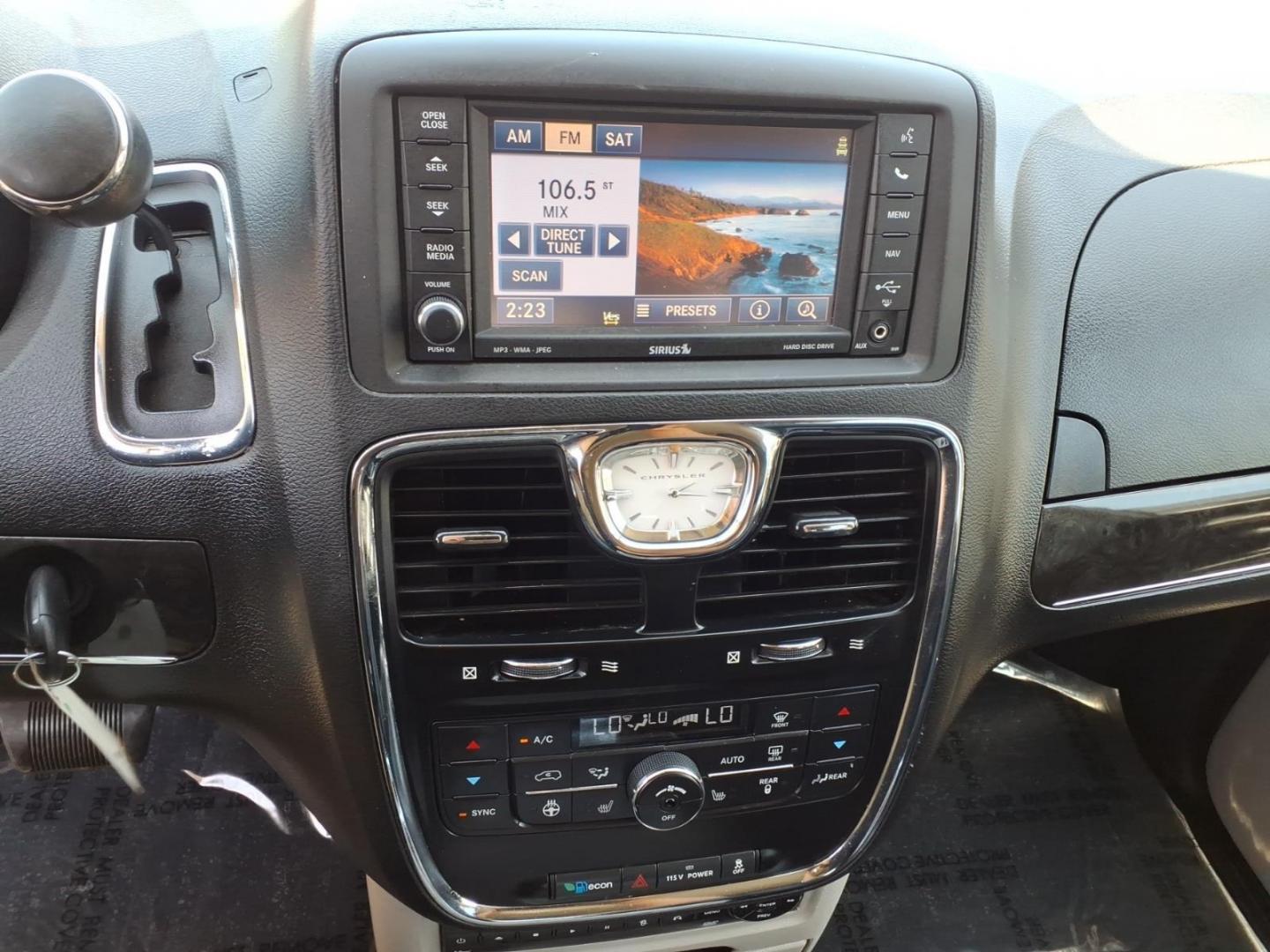 2013 White Chrysler Town and Country Touring-L (2C4RC1CG3DR) with an 3.6L 6 Cylinder Sequential-Port F.I. engine, AT V6 transmission, located at 50 Eastern Blvd., Essex, MD, 21221, (410) 686-3444, 39.304367, -76.484947 - Photo#19