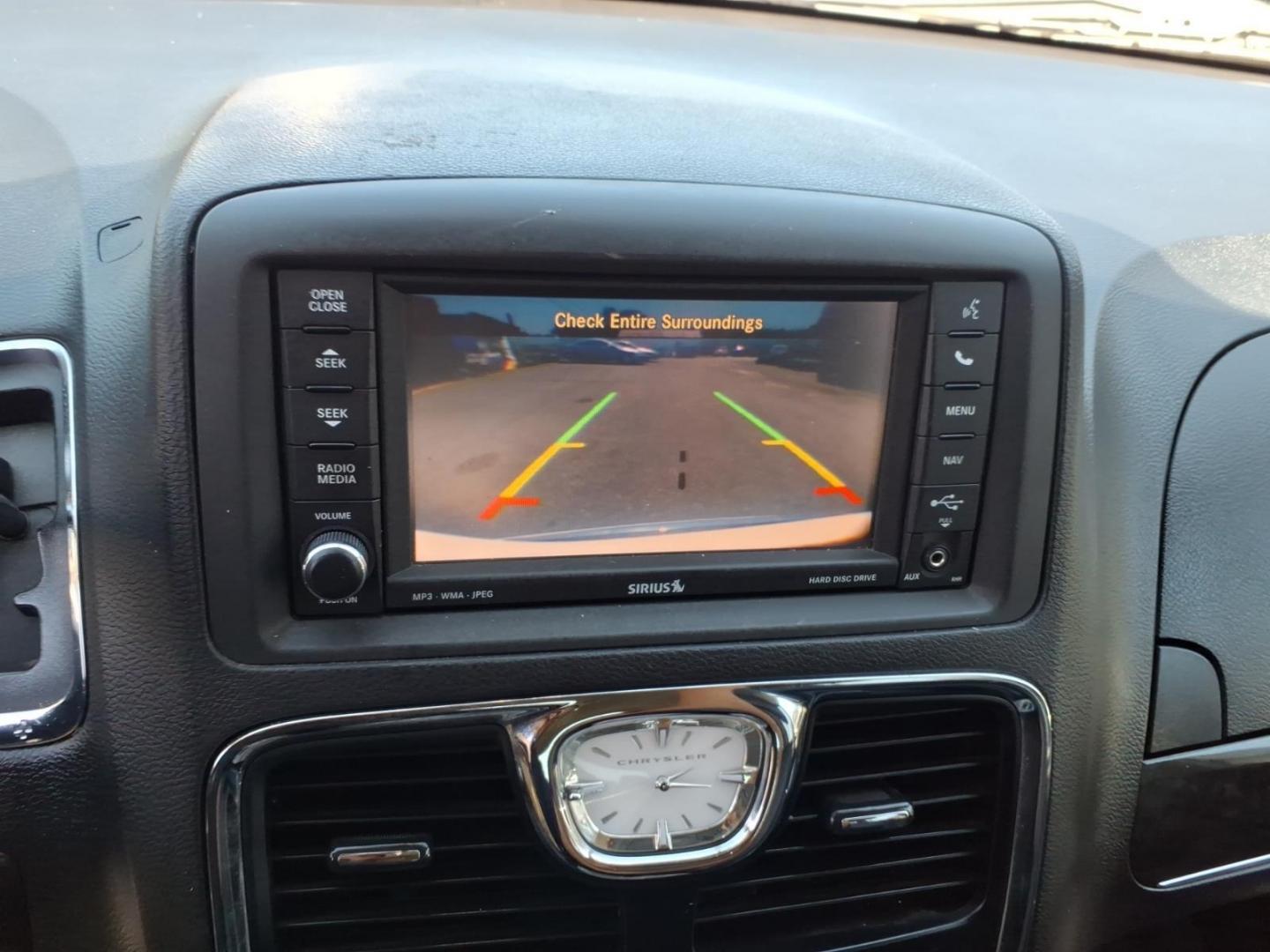 2013 White Chrysler Town and Country Touring-L (2C4RC1CG3DR) with an 3.6L 6 Cylinder Sequential-Port F.I. engine, AT V6 transmission, located at 50 Eastern Blvd., Essex, MD, 21221, (410) 686-3444, 39.304367, -76.484947 - Photo#20
