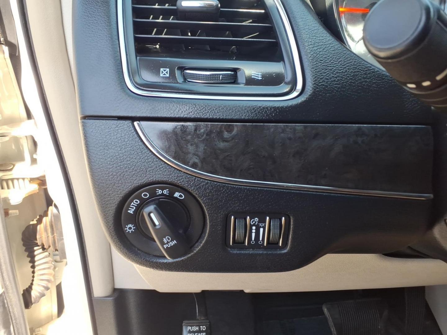 2013 White Chrysler Town and Country Touring-L (2C4RC1CG3DR) with an 3.6L 6 Cylinder Sequential-Port F.I. engine, AT V6 transmission, located at 50 Eastern Blvd., Essex, MD, 21221, (410) 686-3444, 39.304367, -76.484947 - Photo#21