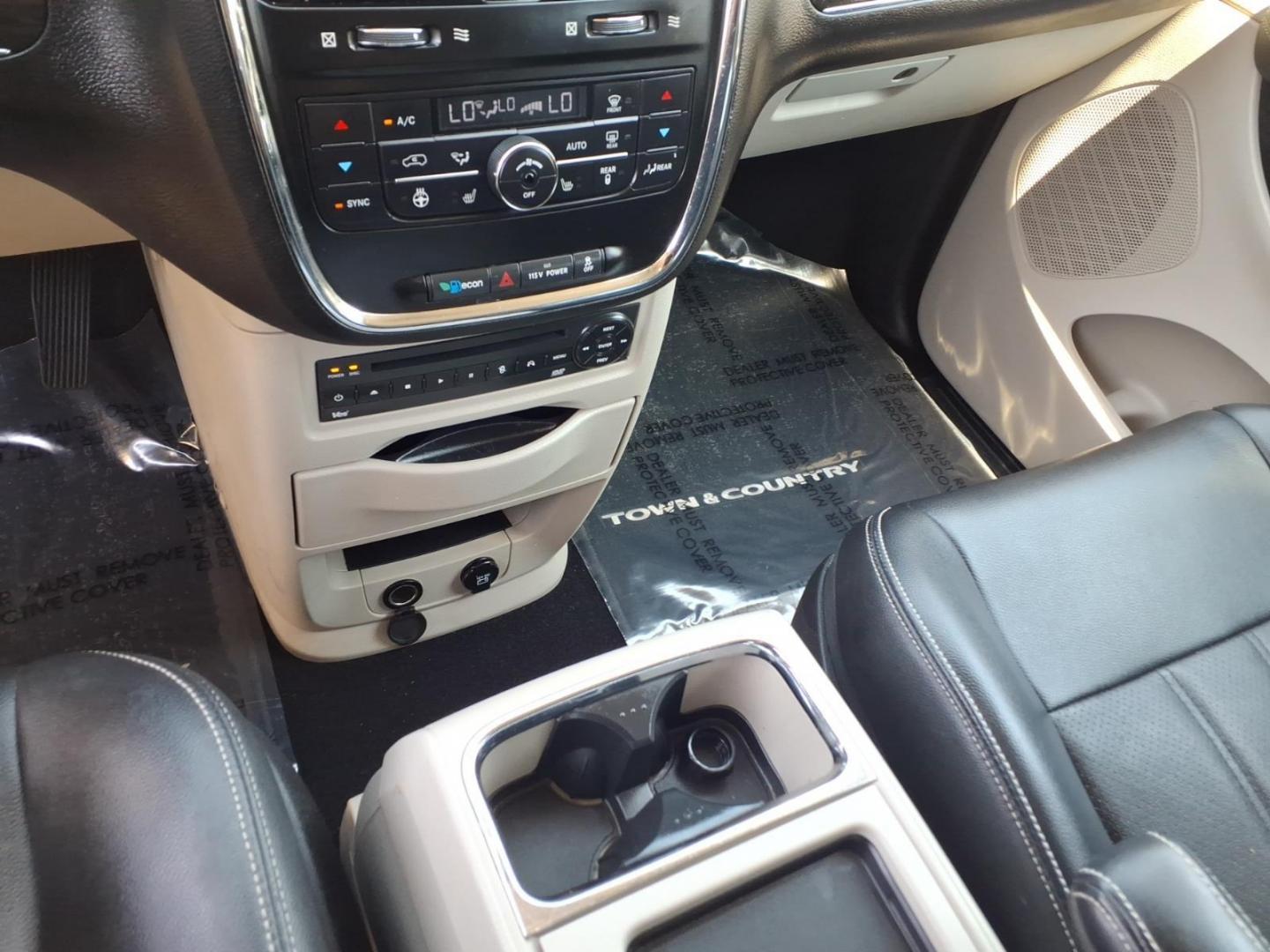 2013 White Chrysler Town and Country Touring-L (2C4RC1CG3DR) with an 3.6L 6 Cylinder Sequential-Port F.I. engine, AT V6 transmission, located at 50 Eastern Blvd., Essex, MD, 21221, (410) 686-3444, 39.304367, -76.484947 - Photo#22