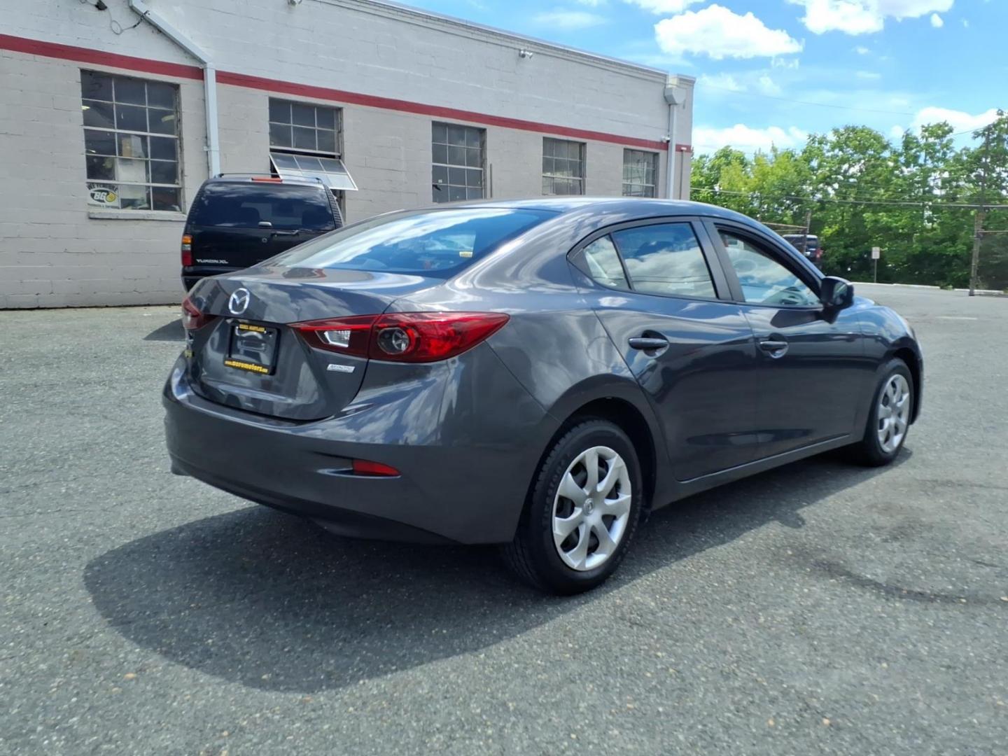 2014 Blue Mazda Mazda3 i Sport (JM1BM1U7XE1) with an 2.0L 4 Cylinder Fuel Injected engine, Automatic transmission, located at 50 Eastern Blvd., Essex, MD, 21221, (410) 686-3444, 39.304367, -76.484947- Photo#3