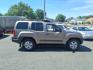 2005 Brown Nissan Xterra SE (5N1AN08U55C) with an 4.0L 4.0L NA V6 double overhead cam (DOHC) 24V Fuel Injected engine, 5-Speed Automatic transmission, located at 50 Eastern Blvd., Essex, MD, 21221, (410) 686-3444, 39.304367, -76.484947 - Photo#4