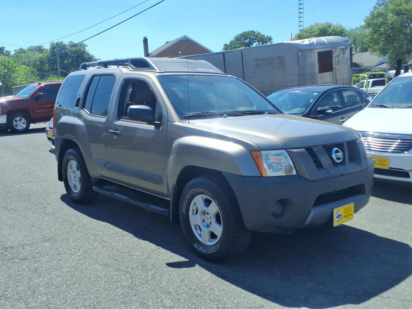 2005 Brown Nissan Xterra SE (5N1AN08U55C) with an 4.0L 4.0L NA V6 double overhead cam (DOHC) 24V Fuel Injected engine, 5-Speed Automatic transmission, located at 50 Eastern Blvd., Essex, MD, 21221, (410) 686-3444, 39.304367, -76.484947 - Photo#5