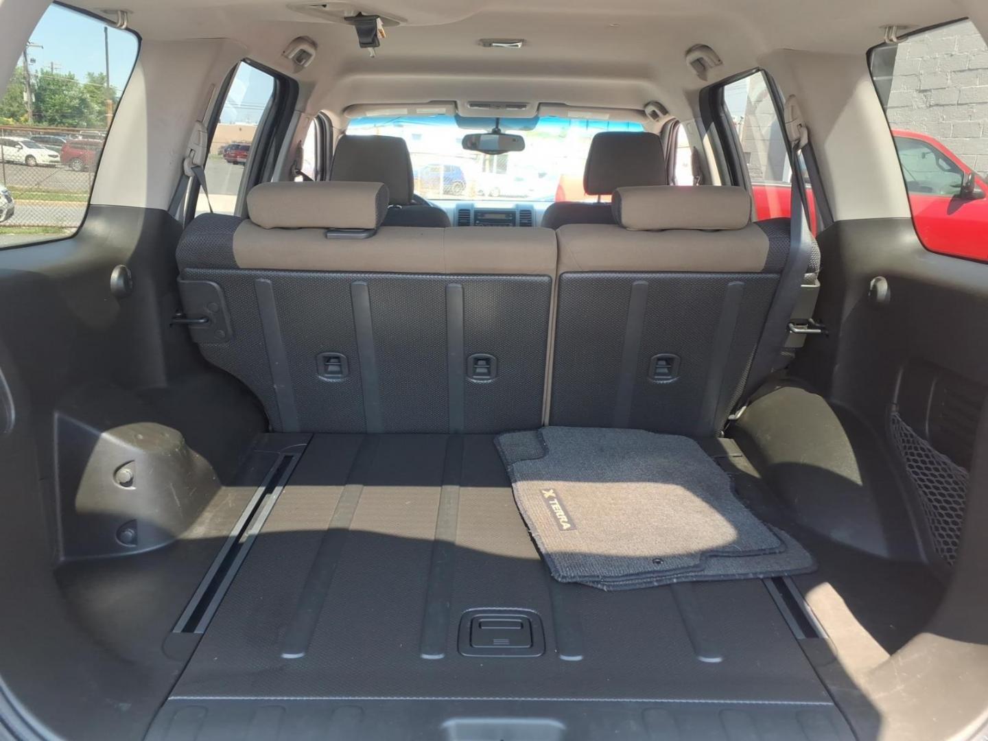 2005 Brown Nissan Xterra SE (5N1AN08U55C) with an 4.0L 4.0L NA V6 double overhead cam (DOHC) 24V Fuel Injected engine, 5-Speed Automatic transmission, located at 50 Eastern Blvd., Essex, MD, 21221, (410) 686-3444, 39.304367, -76.484947 - Photo#12