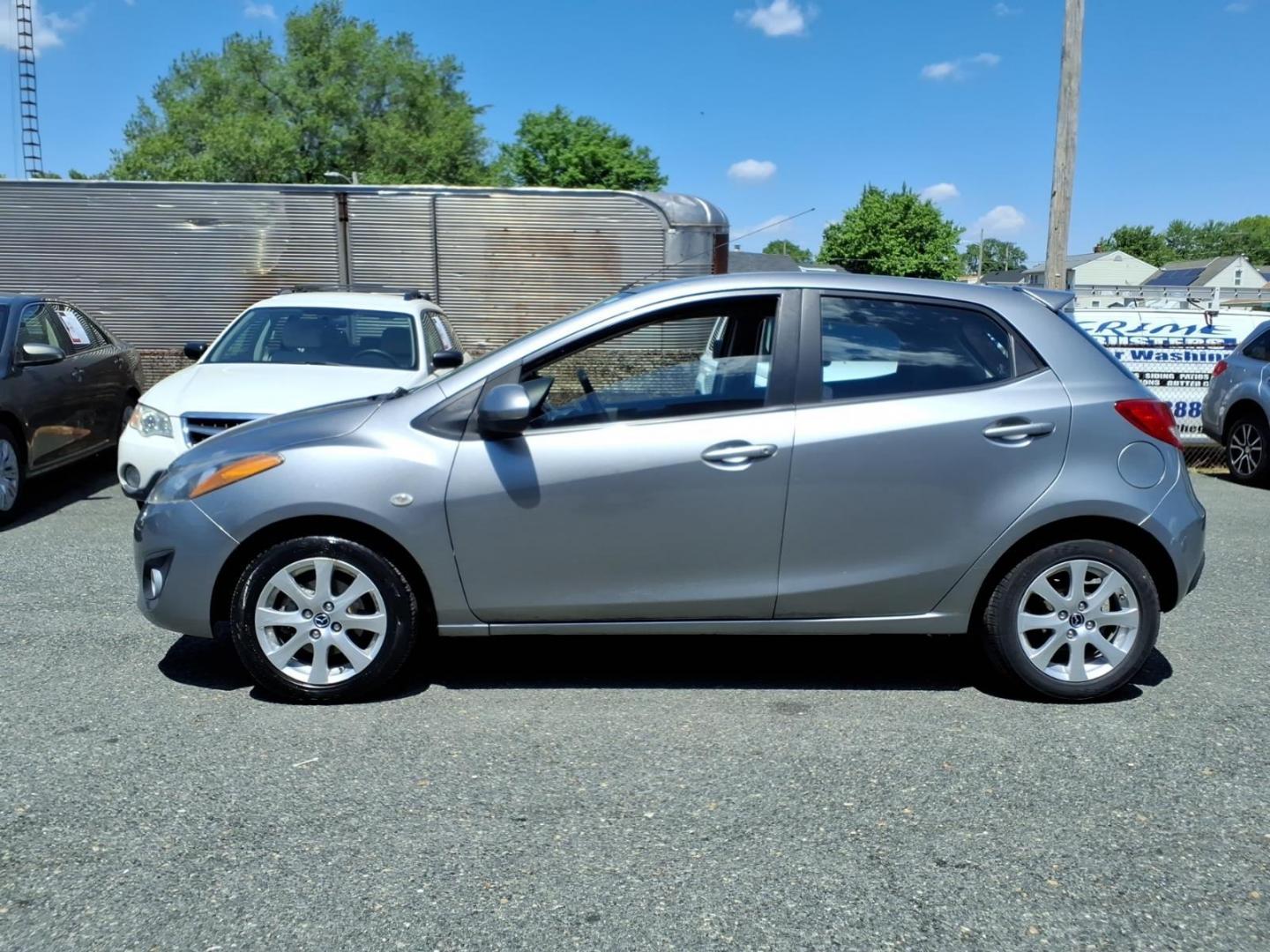 2014 Gray Mazda Mazda2 Touring (JM1DE1LZ4E0) with an 1.5L 4 Cylinder Sequential-Port F.I. engine, Automatic transmission, located at 50 Eastern Blvd., Essex, MD, 21221, (410) 686-3444, 39.304367, -76.484947 - Photo#1