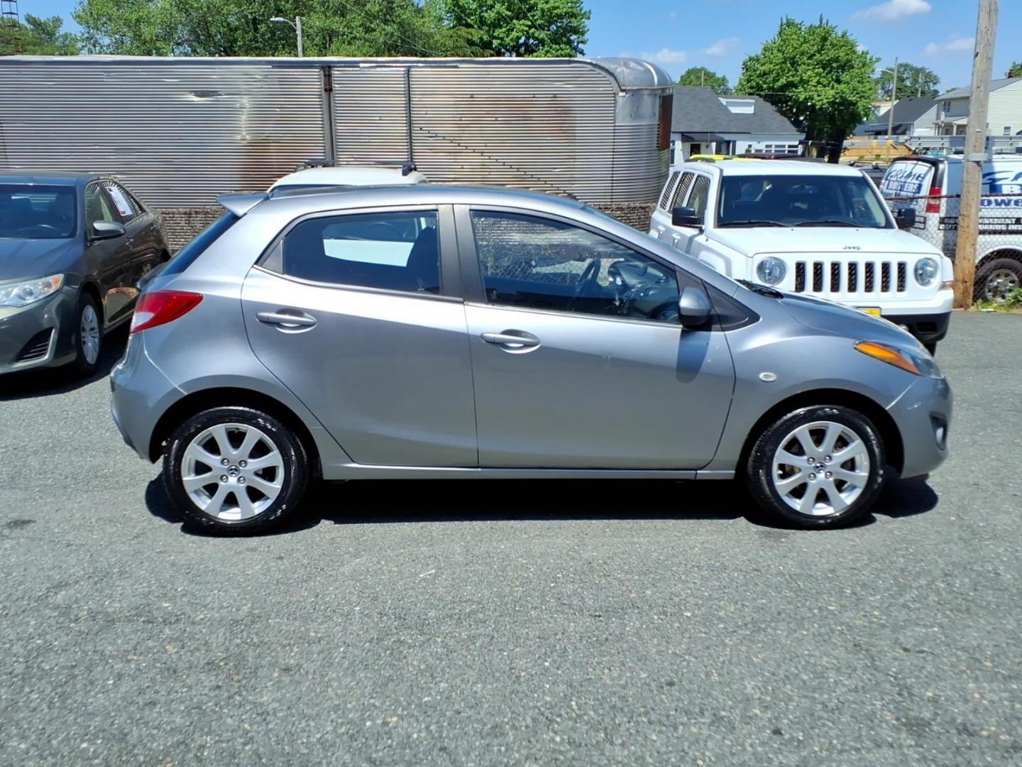 2014 Gray Mazda Mazda2 Touring (JM1DE1LZ4E0) with an 1.5L 4 Cylinder Sequential-Port F.I. engine, Automatic transmission, located at 50 Eastern Blvd., Essex, MD, 21221, (410) 686-3444, 39.304367, -76.484947 - Photo#4