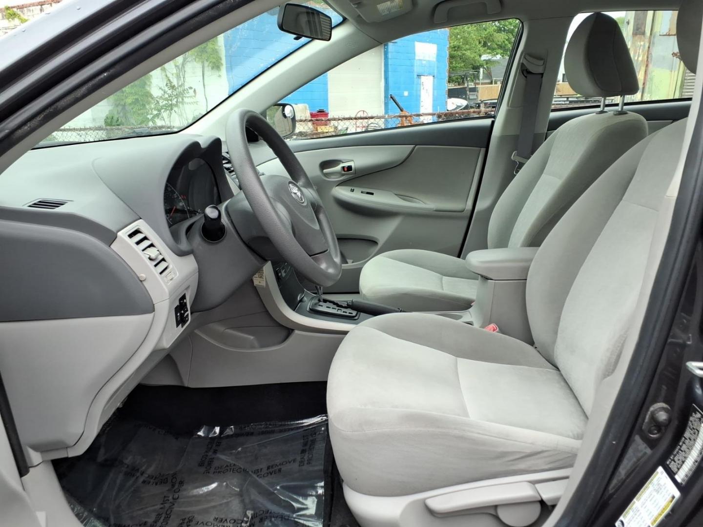 2009 Gray Toyota Corolla LE (2T1BU40E19C) with an 1.8L 1.8L I4 132hp 128ft. lbs. Sequential Fuel Injection engine, 4-Speed Automatic transmission, located at 50 Eastern Blvd., Essex, MD, 21221, (410) 686-3444, 39.304367, -76.484947 - Photo#7