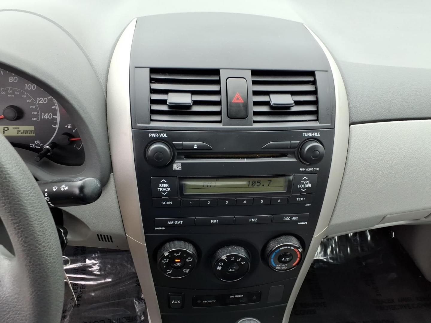 2009 Gray Toyota Corolla LE (2T1BU40E19C) with an 1.8L 1.8L I4 132hp 128ft. lbs. Sequential Fuel Injection engine, 4-Speed Automatic transmission, located at 50 Eastern Blvd., Essex, MD, 21221, (410) 686-3444, 39.304367, -76.484947 - Photo#16