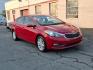 2015 Red Kia Forte EX (KNAFX4A8XF5) with an 2.0L 4 Cylinder Fuel Injected engine, 4CYL transmission, located at 50 Eastern Blvd., Essex, MD, 21221, (410) 686-3444, 39.304367, -76.484947 - Photo#6