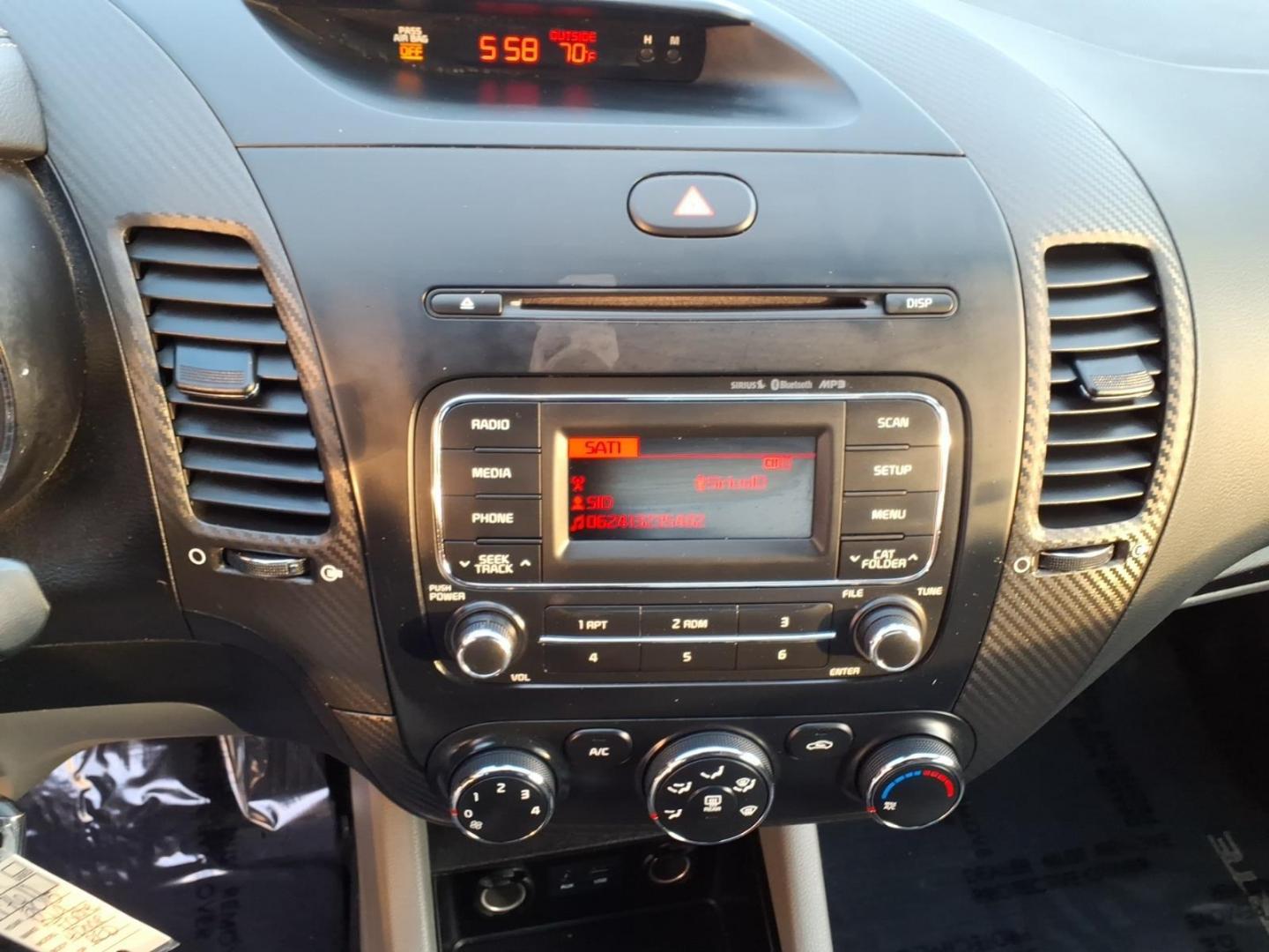 2015 Red Kia Forte EX (KNAFX4A8XF5) with an 2.0L 4 Cylinder Fuel Injected engine, 4CYL transmission, located at 50 Eastern Blvd., Essex, MD, 21221, (410) 686-3444, 39.304367, -76.484947 - Photo#18