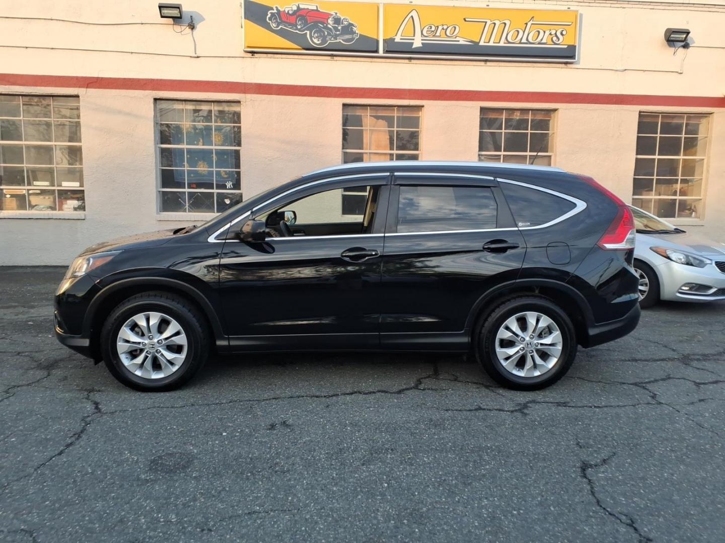 2012 Black Honda CR-V EX-L w/DVD (JHLRM3H79CC) with an 2.4L 2.4L I4 185hp 163ft. lbs. Sequential-Port F.I. engine, 5-Speed Automatic transmission, located at 50 Eastern Blvd., Essex, MD, 21221, (410) 686-3444, 39.304367, -76.484947 - Photo#1