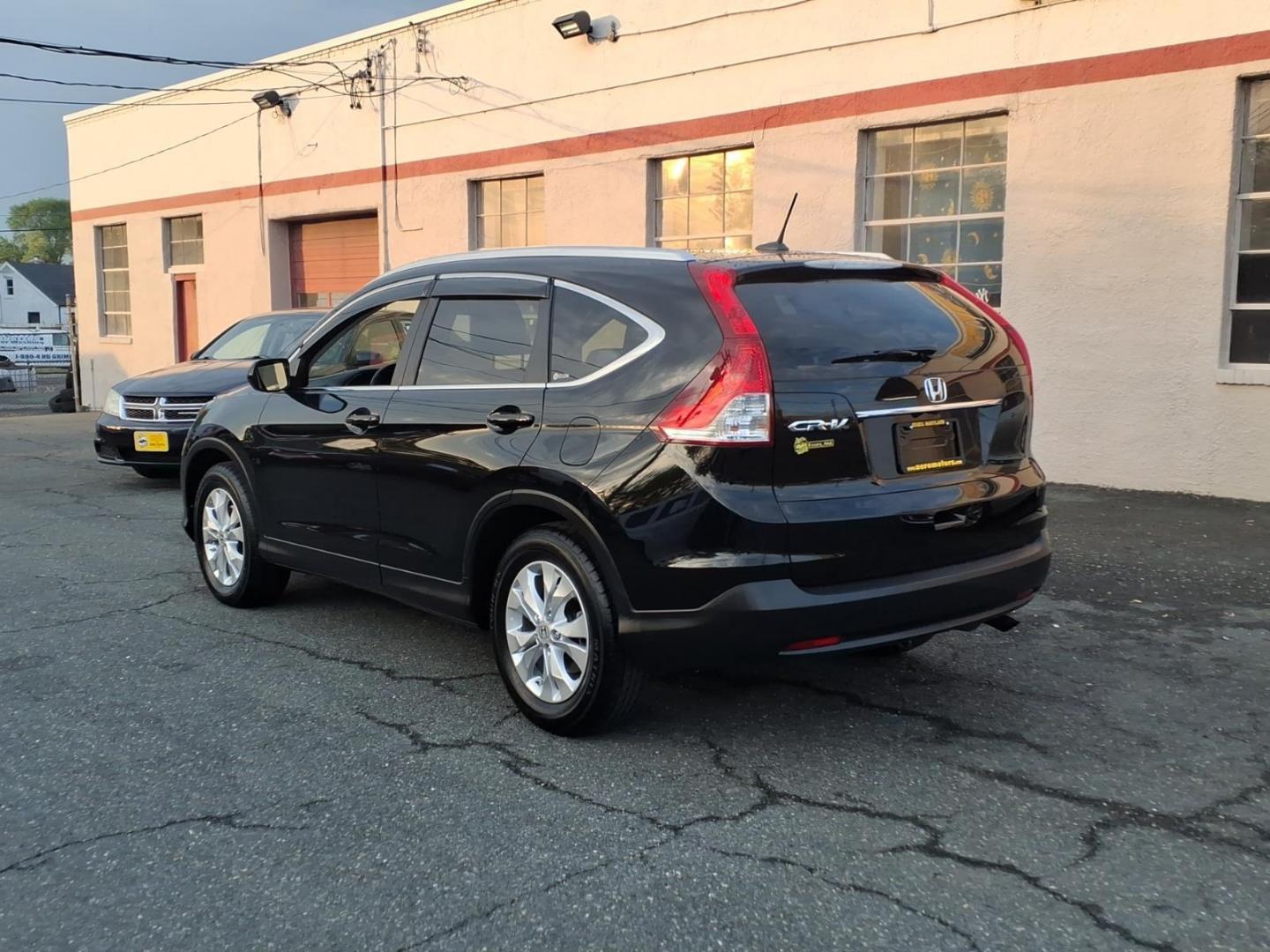 2012 Black Honda CR-V EX-L w/DVD (JHLRM3H79CC) with an 2.4L 2.4L I4 185hp 163ft. lbs. Sequential-Port F.I. engine, 5-Speed Automatic transmission, located at 50 Eastern Blvd., Essex, MD, 21221, (410) 686-3444, 39.304367, -76.484947 - Photo#2