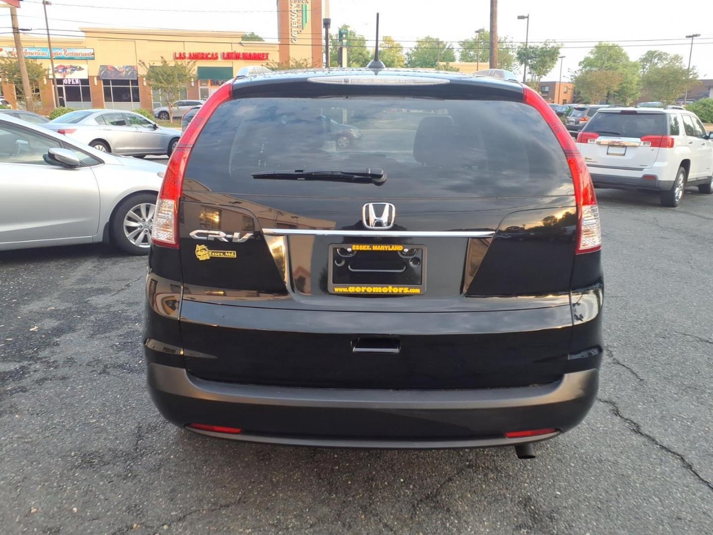 2012 Black Honda CR-V EX-L w/DVD (JHLRM3H79CC) with an 2.4L 2.4L I4 185hp 163ft. lbs. Sequential-Port F.I. engine, 5-Speed Automatic transmission, located at 50 Eastern Blvd., Essex, MD, 21221, (410) 686-3444, 39.304367, -76.484947 - Photo#3