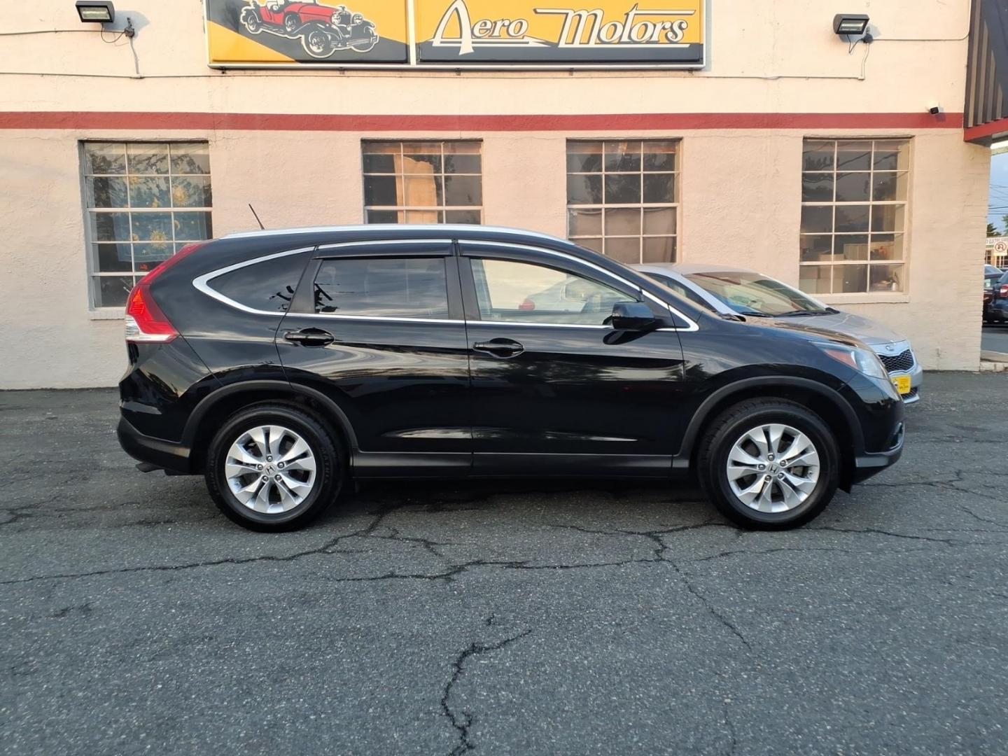 2012 Black Honda CR-V EX-L w/DVD (JHLRM3H79CC) with an 2.4L 2.4L I4 185hp 163ft. lbs. Sequential-Port F.I. engine, 5-Speed Automatic transmission, located at 50 Eastern Blvd., Essex, MD, 21221, (410) 686-3444, 39.304367, -76.484947 - Photo#5