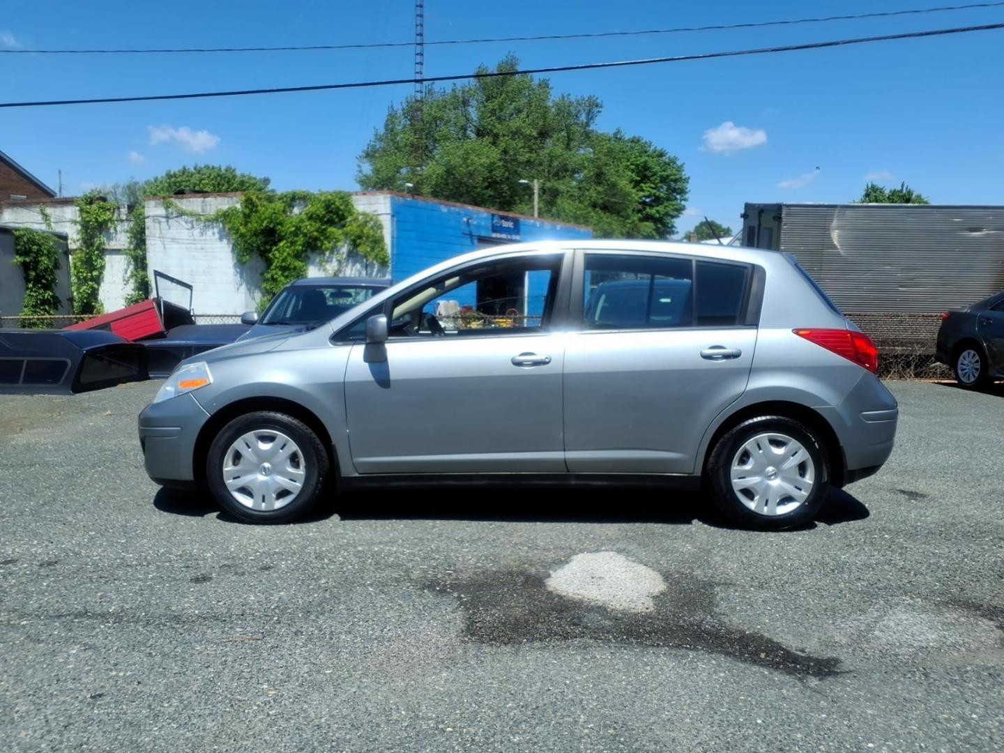 2010 Grey Nissan Versa 1.8 S (3N1BC1CP5AL) with an 1.8L 1.8L I4 122hp 127ft. lbs. Sequential-Port F.I. engine, 4-Speed Automatic transmission, located at 50 Eastern Blvd., Essex, MD, 21221, (410) 686-3444, 39.304367, -76.484947 - Photo#1