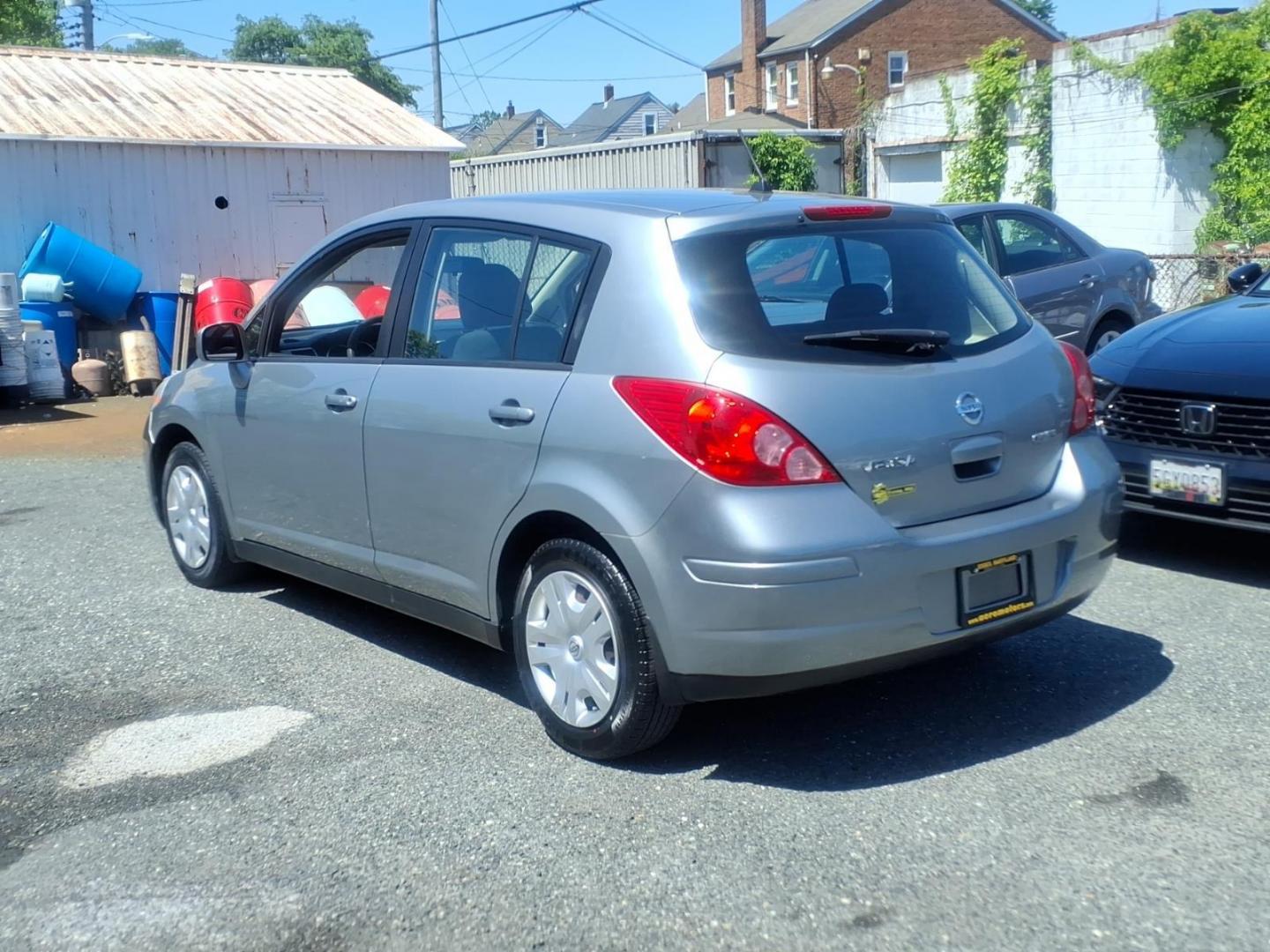2010 Grey Nissan Versa 1.8 S (3N1BC1CP5AL) with an 1.8L 1.8L I4 122hp 127ft. lbs. Sequential-Port F.I. engine, 4-Speed Automatic transmission, located at 50 Eastern Blvd., Essex, MD, 21221, (410) 686-3444, 39.304367, -76.484947 - Photo#2