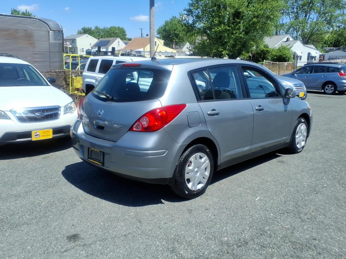 2010 Grey Nissan Versa 1.8 S (3N1BC1CP5AL) with an 1.8L 1.8L I4 122hp 127ft. lbs. Sequential-Port F.I. engine, 4-Speed Automatic transmission, located at 50 Eastern Blvd., Essex, MD, 21221, (410) 686-3444, 39.304367, -76.484947 - Photo#3