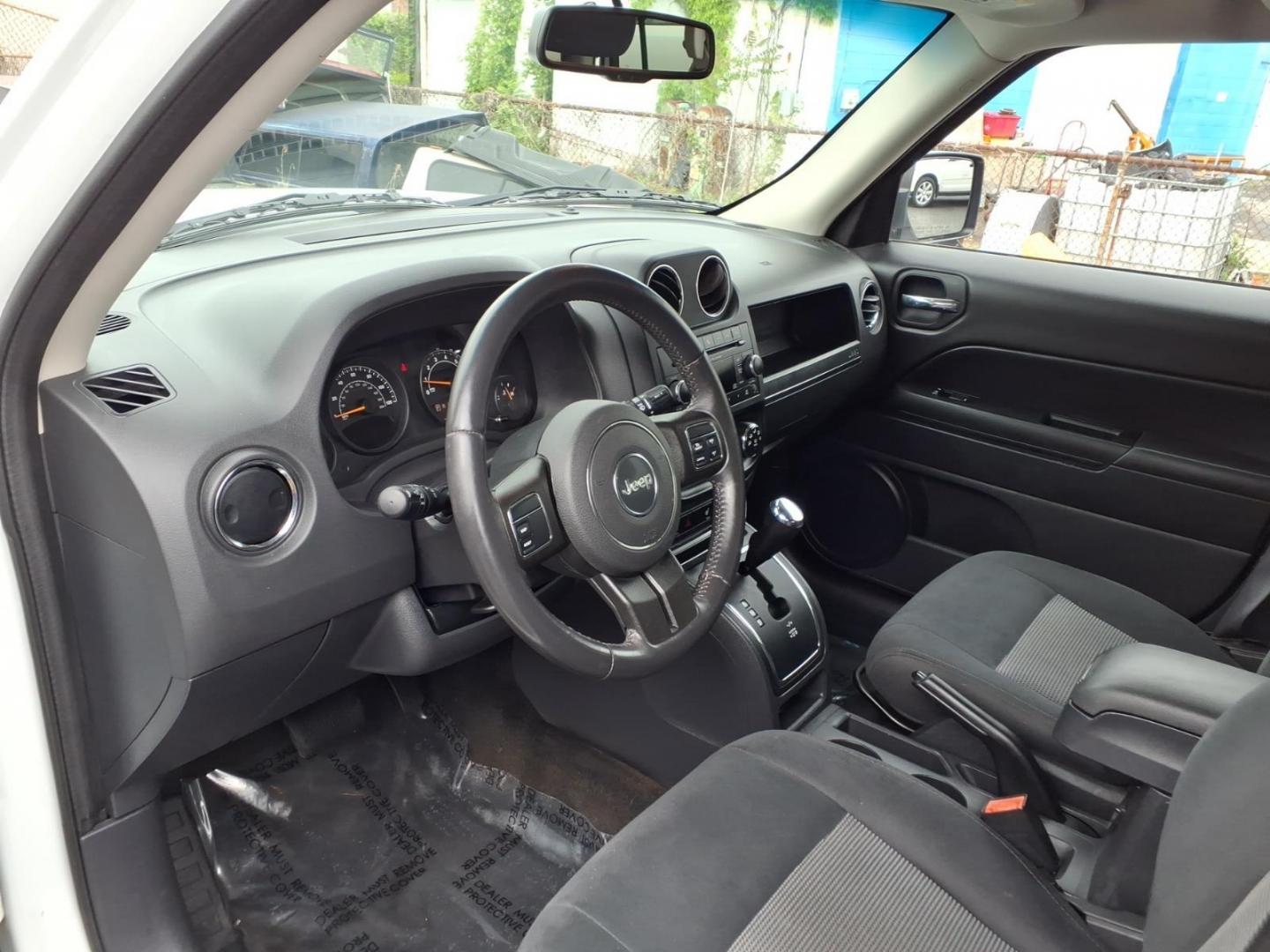 2016 White Jeep Patriot Latitude (1C4NJRFB0GD) with an 2.4L 4 Cylinder Sequential-Port F.I. engine, Automatic transmission, located at 50 Eastern Blvd., Essex, MD, 21221, (410) 686-3444, 39.304367, -76.484947 - Photo#8