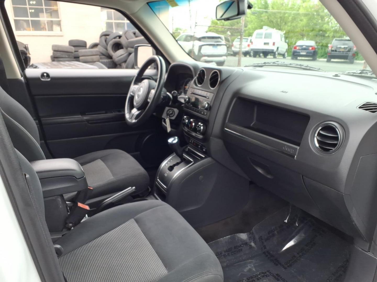 2016 White Jeep Patriot Latitude (1C4NJRFB0GD) with an 2.4L 4 Cylinder Sequential-Port F.I. engine, Automatic transmission, located at 50 Eastern Blvd., Essex, MD, 21221, (410) 686-3444, 39.304367, -76.484947 - Photo#13