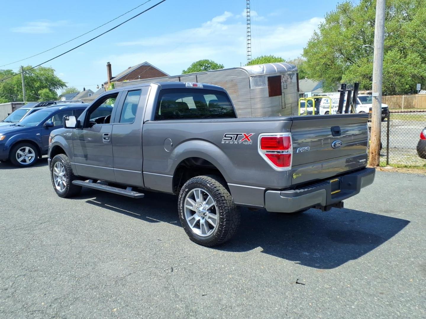 2014 Sterling Gray Metallic Ford F-150 STX (1FTFX1EF9EF) with an 5.0L 5.0L Flex Fuel V8 360hp 380ft. lbs. Sequential Multiport Fuel Injection engine, 6-Speed Automatic transmission, located at 50 Eastern Blvd., Essex, MD, 21221, (410) 686-3444, 39.304367, -76.484947 - Photo#2