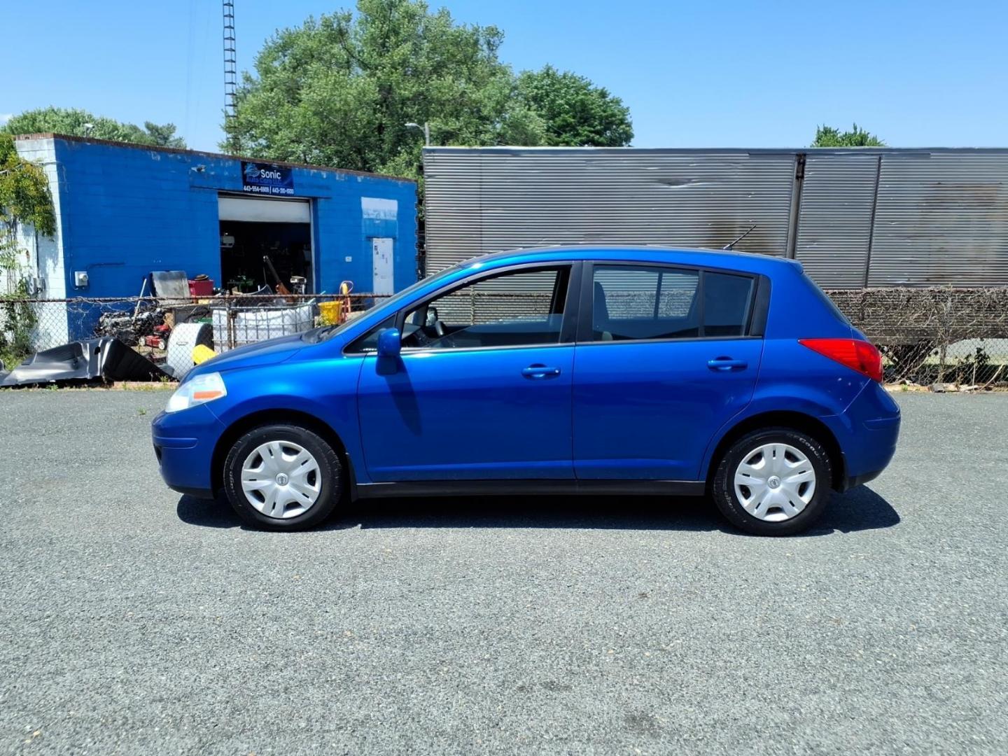 2012 Blue Nissan Versa 1.8 S (3N1BC1CPXCK) with an 1.8L 1.8L I4 122hp 127ft. lbs. Sequential-Port F.I. engine, 4-Speed Automatic transmission, located at 50 Eastern Blvd., Essex, MD, 21221, (410) 686-3444, 39.304367, -76.484947 - Photo#1