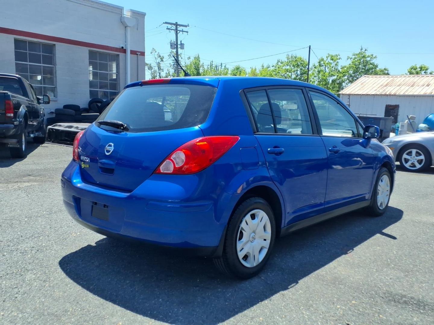 2012 Blue Nissan Versa 1.8 S (3N1BC1CPXCK) with an 1.8L 1.8L I4 122hp 127ft. lbs. Sequential-Port F.I. engine, 4-Speed Automatic transmission, located at 50 Eastern Blvd., Essex, MD, 21221, (410) 686-3444, 39.304367, -76.484947 - Photo#3