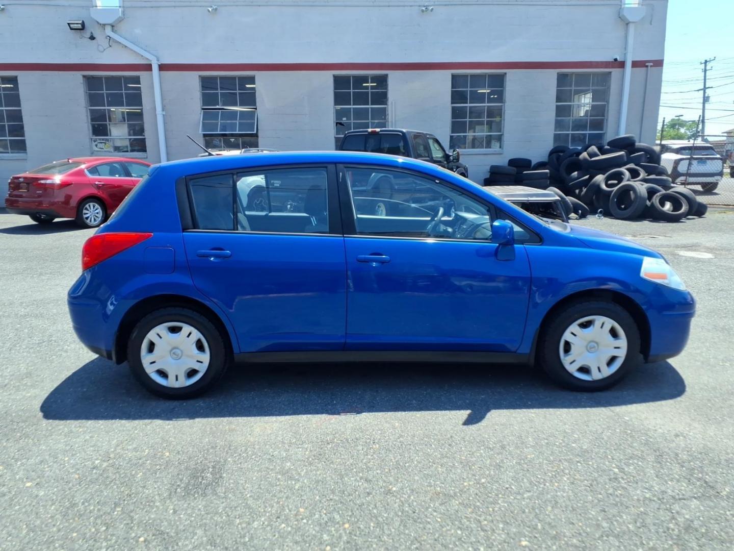 2012 Blue Nissan Versa 1.8 S (3N1BC1CPXCK) with an 1.8L 1.8L I4 122hp 127ft. lbs. Sequential-Port F.I. engine, 4-Speed Automatic transmission, located at 50 Eastern Blvd., Essex, MD, 21221, (410) 686-3444, 39.304367, -76.484947 - Photo#4