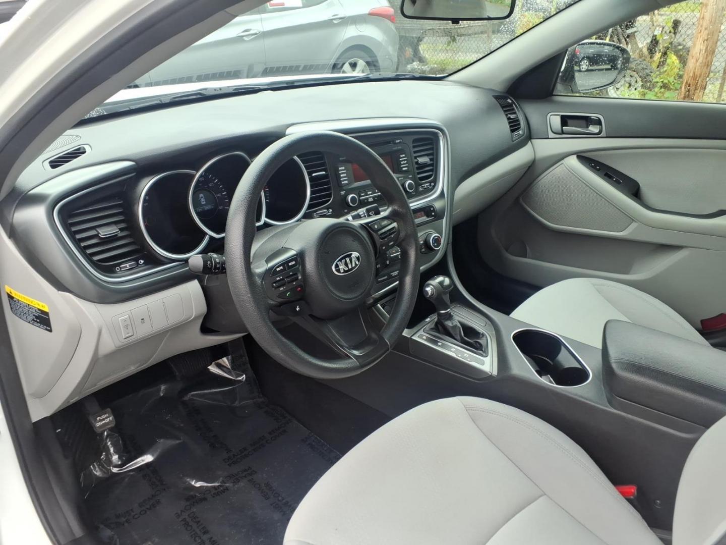 2015 White Kia Optima LX (KNAGM4A79F5) with an 2.4L 4 Cylinder Fuel Injected engine, Automatic transmission, located at 50 Eastern Blvd., Essex, MD, 21221, (410) 686-3444, 39.304367, -76.484947 - Photo#7